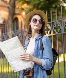 stylish-tourist-with-hat-sunglasses.webp
